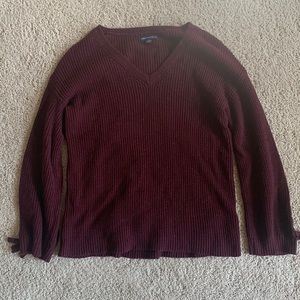 Maroon sweater with tied sleeves